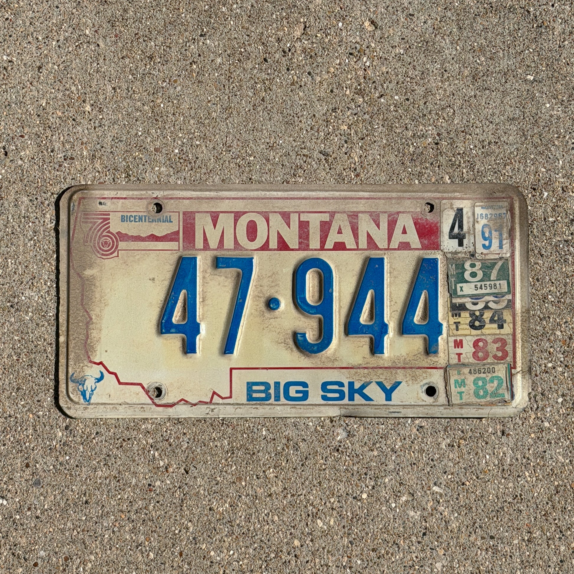 Photo of a 1976 1991 Montana License Plate Auto Tag Garage Decor Vintage Bicentennial 47 944 with original patina