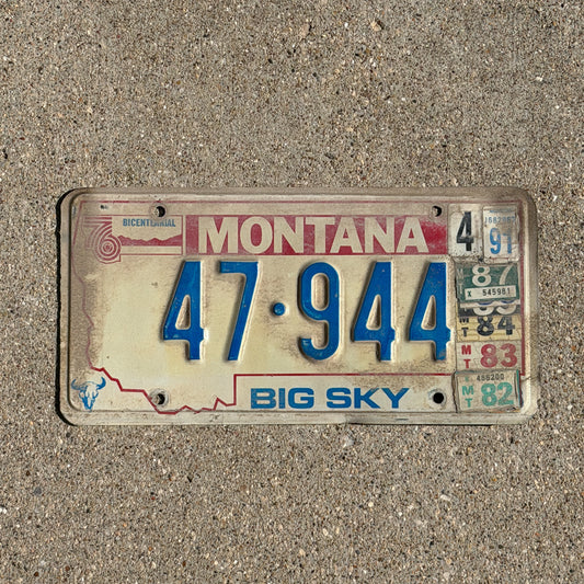 Photo of a 1976 1991 Montana License Plate Auto Tag Garage Decor Vintage Bicentennial 47 944 with original patina