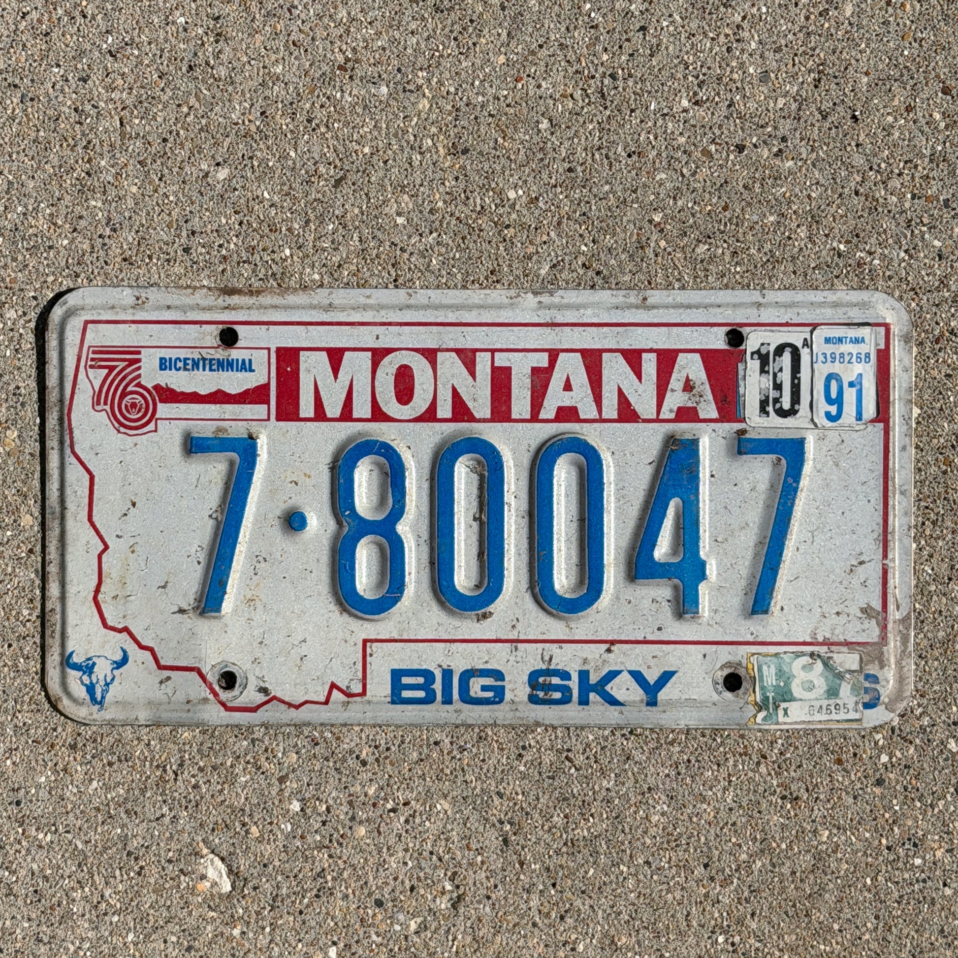 Photo of a 1976 1991 Montana License Plate Auto Tag Garage Decor Vintage Bicentennial 7 80047 with original patina