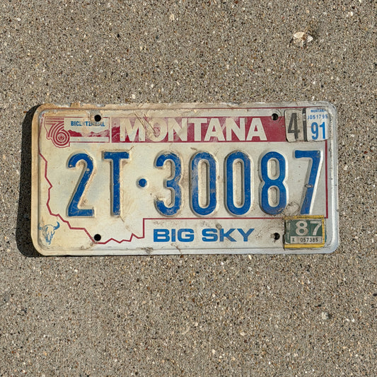 Photo of a 1976 1991 Montana Truck License Plate Auto Tag Garage Decor Vintage Bicentennial 2T 30087 with original patina