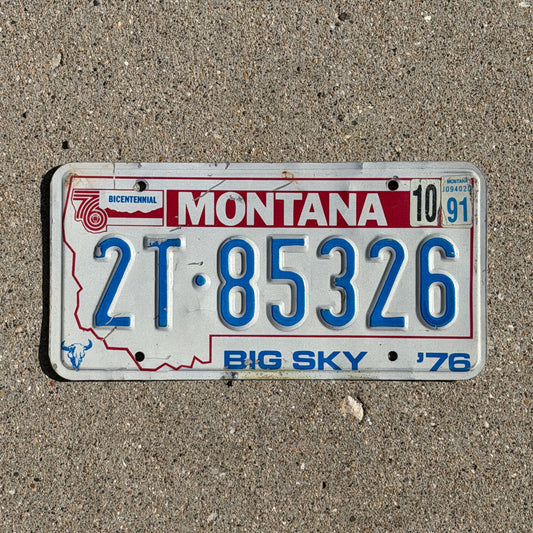 Photo of a 1976 1991 Montana Truck License Plate Auto Tag Garage Decor Vintage Bicentennial 2T 85326 with original patina