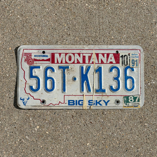 Photo of a 1976 1991 Montana Truck License Plate Auto Tag Garage Decor Vintage Bicentennial 56 TK 136 with original patina