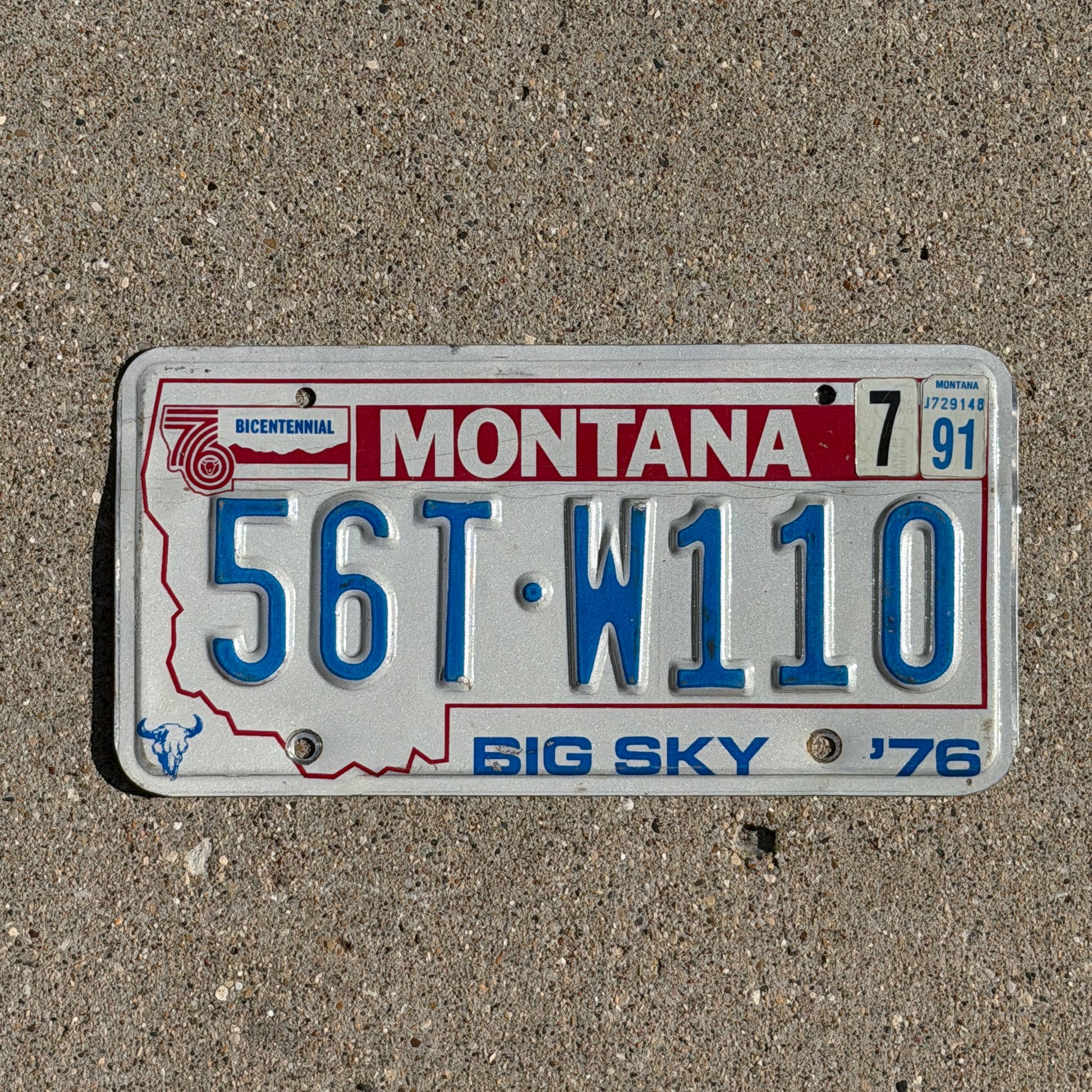 Photo of a 1976 1991 Montana Truck License Plate Auto Tag Garage Decor Vintage Bicentennial 56 TW 110 with original patina