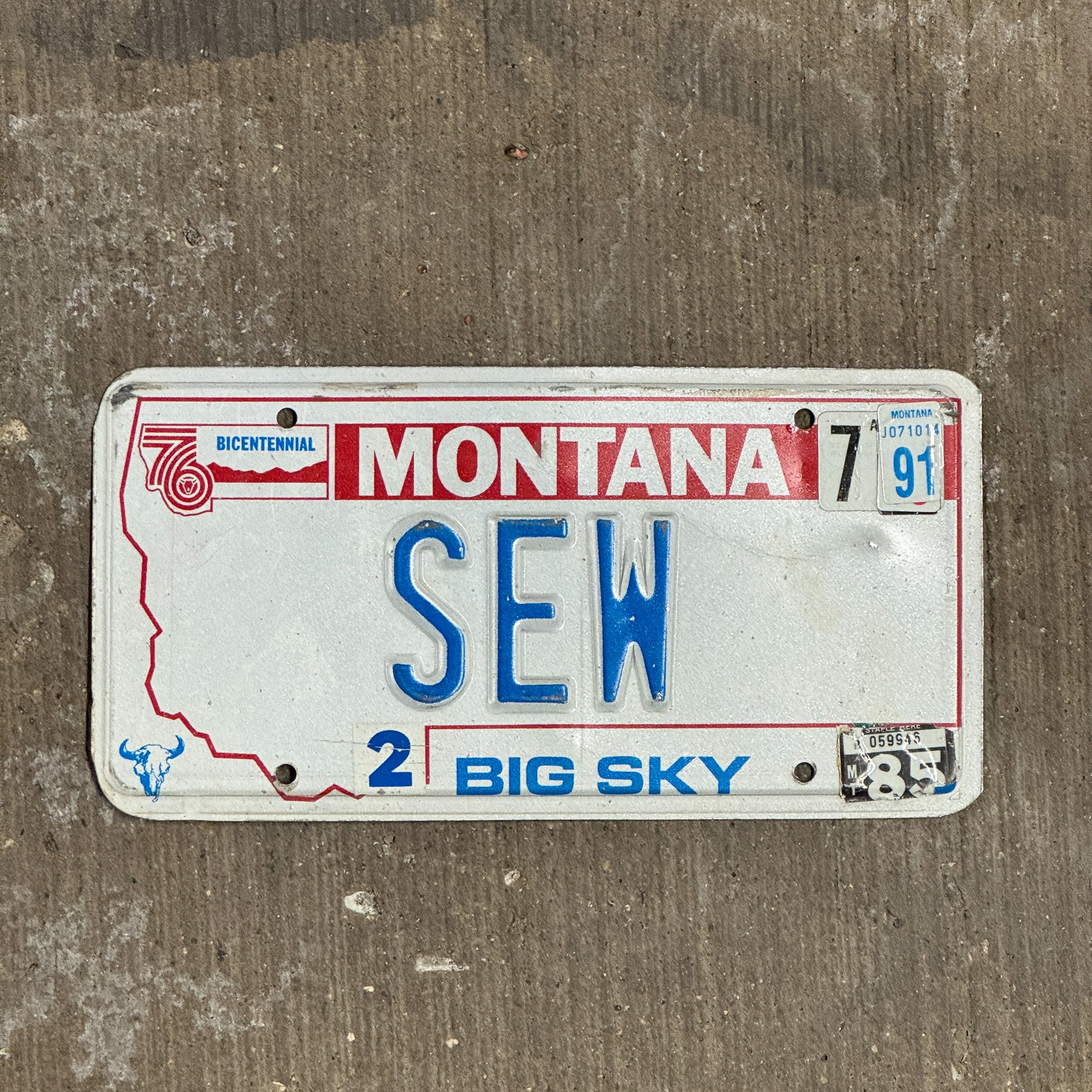 Photo of a 1976 1991 Montana Vanity License Plate Auto Tag Garage Decor Vintage Sewing Room Decor SEW with original patina
