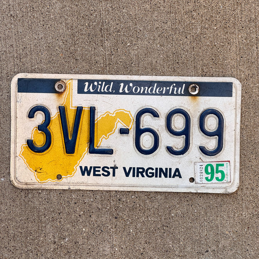 Photo of a 1976 1995 West Virginia License Plate Auto Tag Garage Decor Vintage 3VL 699 with original patina