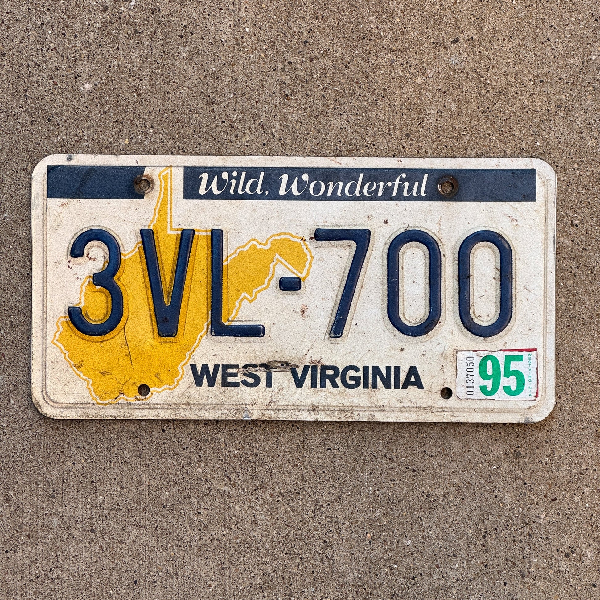 Photo of a 1976 1995 West Virginia License Plate Auto Tag Garage Decor Vintage 3VL 700 with original patina