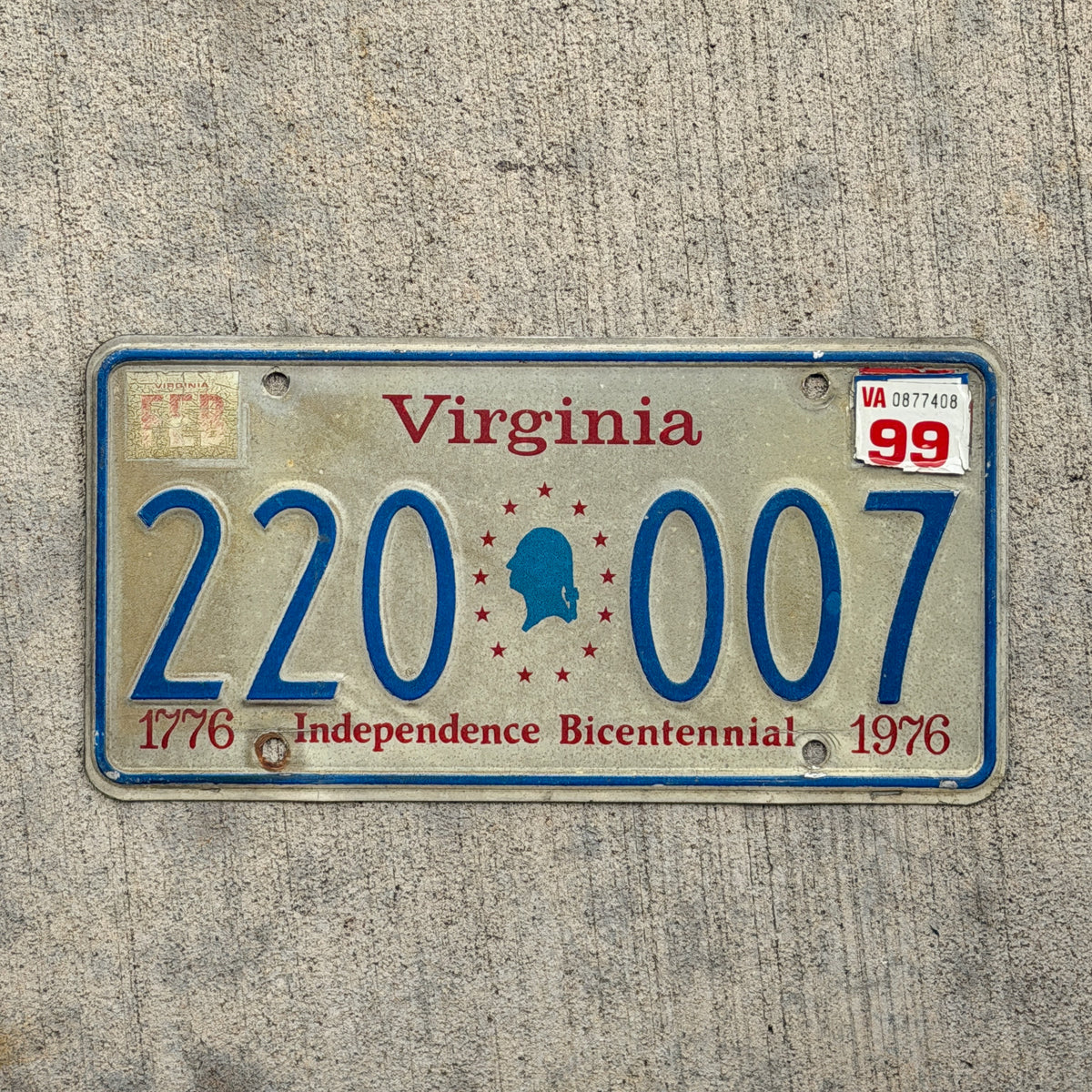 Photo of a 1976 1999 Virginia Graphic / Specialty License Plate Auto Tag Garage Decor Vintage Bicentennial George Washington 220 007 with original patina