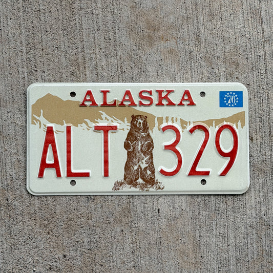 Photo of a 1976 Alaska License Plate Auto Tag 2 Vintage Garage Bicentennial Bear ALT 329 with original patina