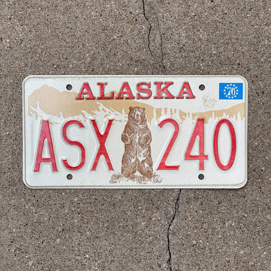 Photo of a 1976 Alaska License Plate Auto Tag Garage Decor Vintage Standing Bear Base ASX 240 with original patina