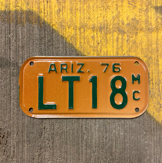 Photo of a 1976 Arizona Motorcycle License Plate Auto Tag Garage Decor Vintage LT 18 with original patina