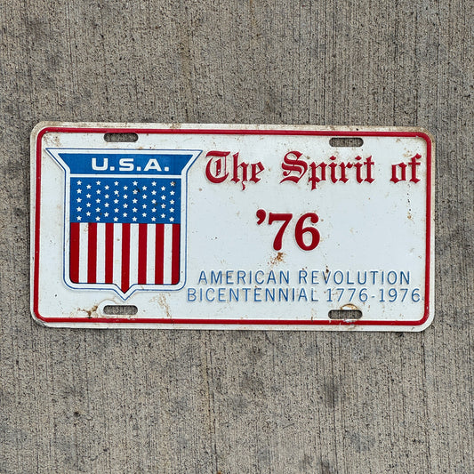 Photo of a 1976 Auto Tag Garage Decor Vintage American Revolution Bicentennial Spirit of '76 with original patina