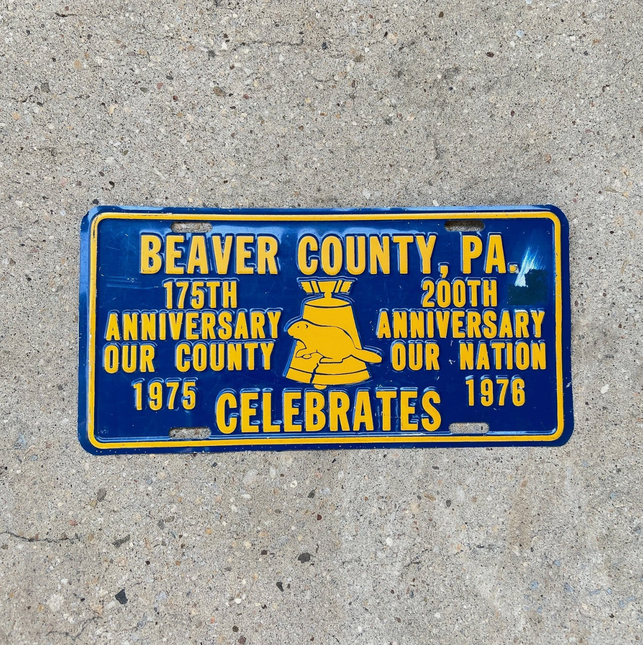 Photo of a 1976 Beaver County Pennsylvania Booster License Plate Auto Tag Garage Decor Vintage Metal Bicentennial with original patina