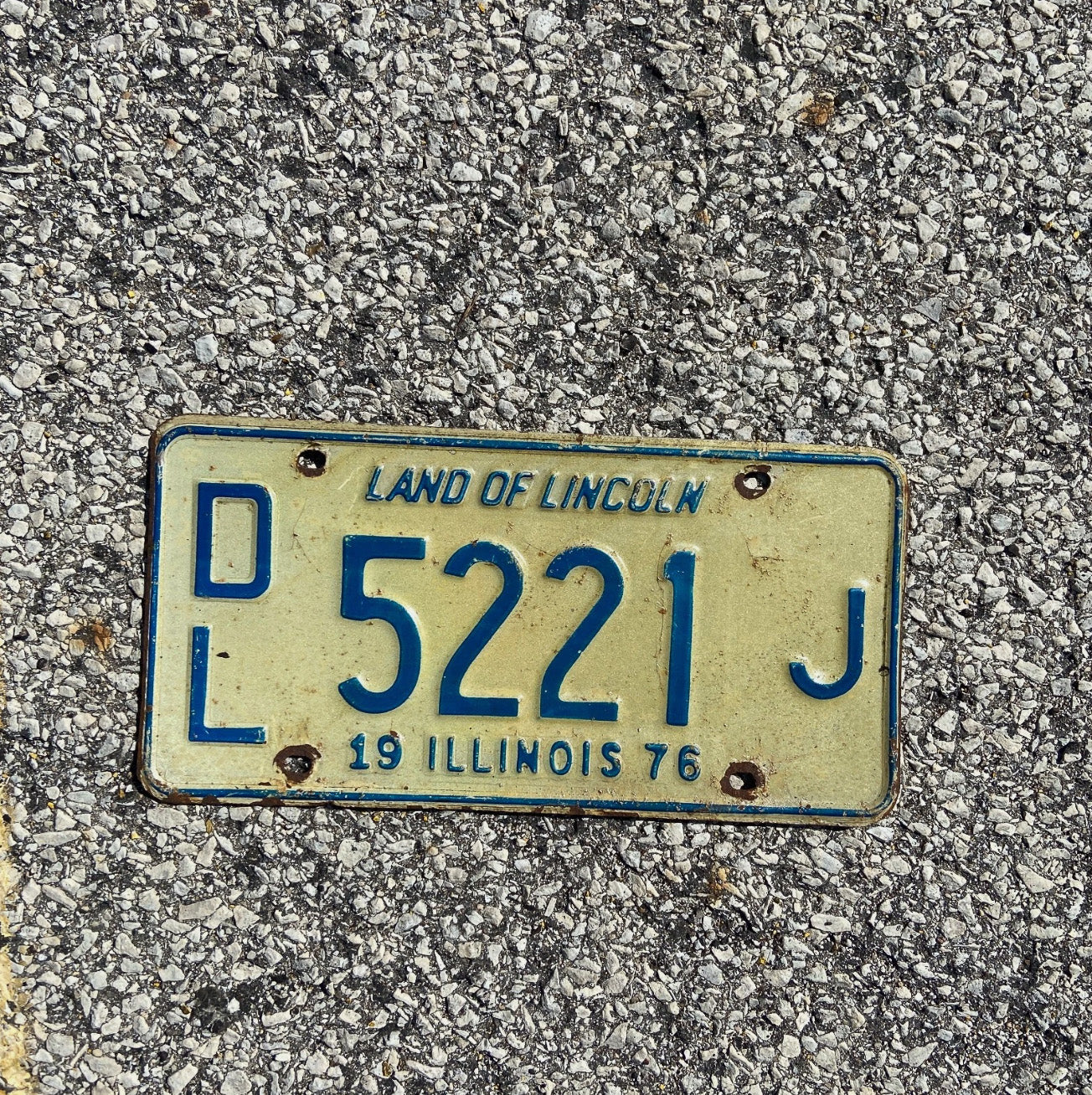 Photo of a 1976 Illinois Dealer License Plate Auto Tag Garage Decor Vintage DL 5221 J