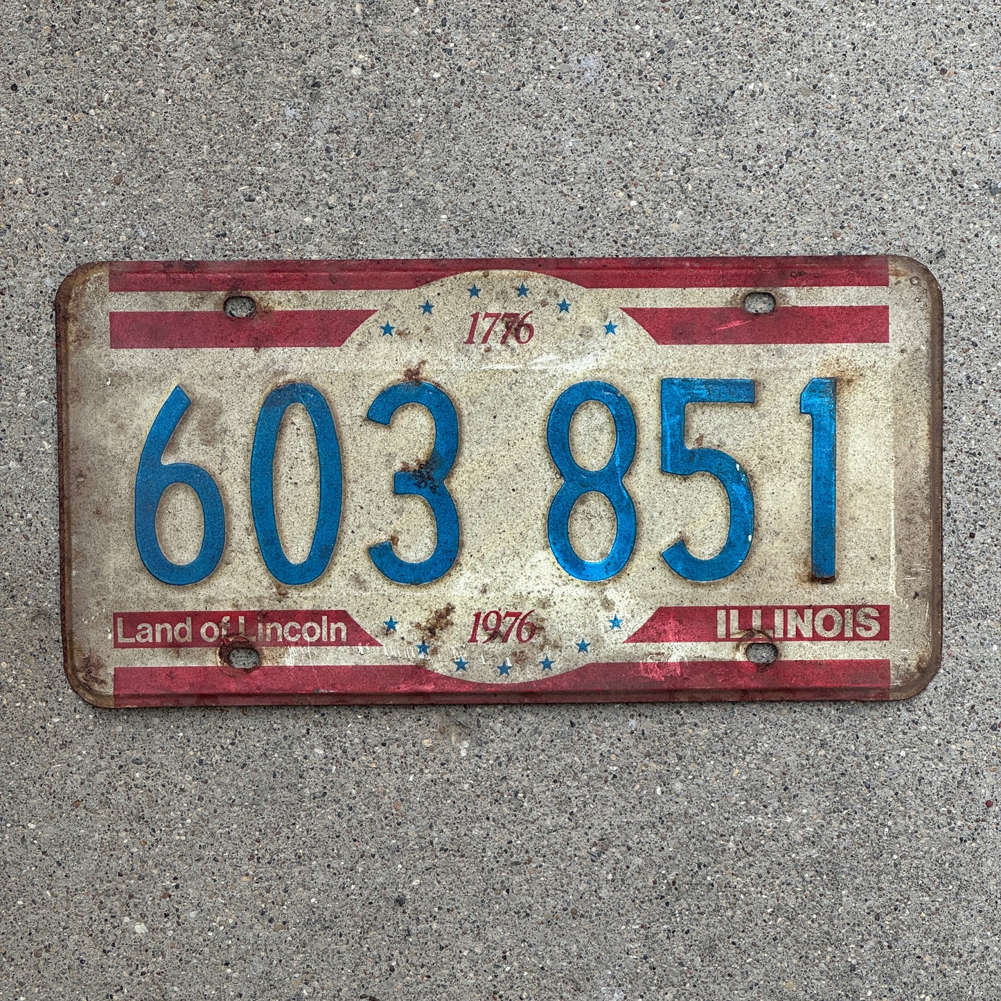 Photo of a 1976 Illinois License Plate Auto Tag 1 Vintage Garage Bicentennial 603 851 with original patina