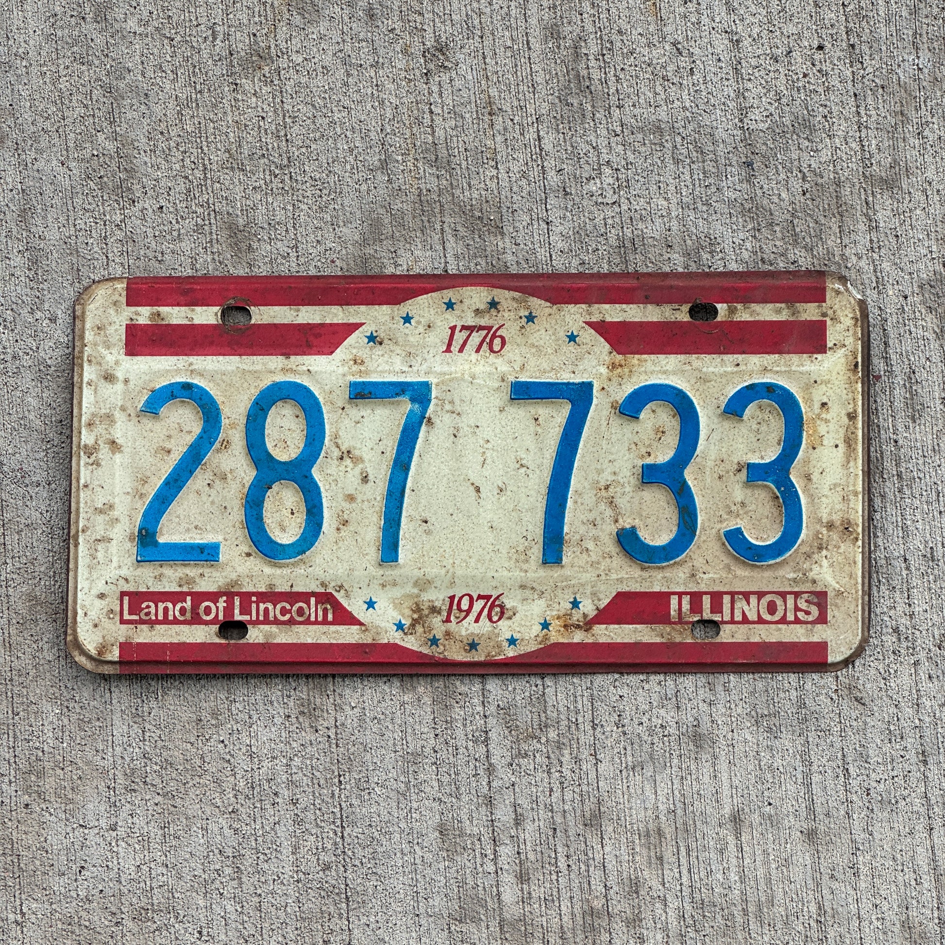 Photo of a 1976 Illinois License Plate Auto Tag 2 Vintage Garage Bicentennial 287 733 with original patina