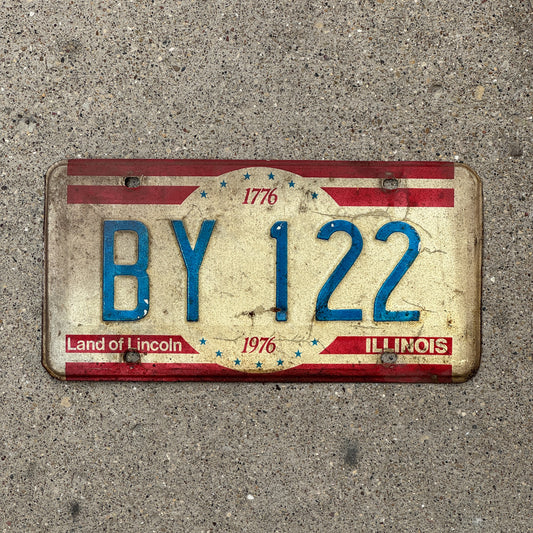 Photo of a 1976 Illinois License Plate Auto Tag 2 Vintage Garage Bicentennial BY 122 with original patina
