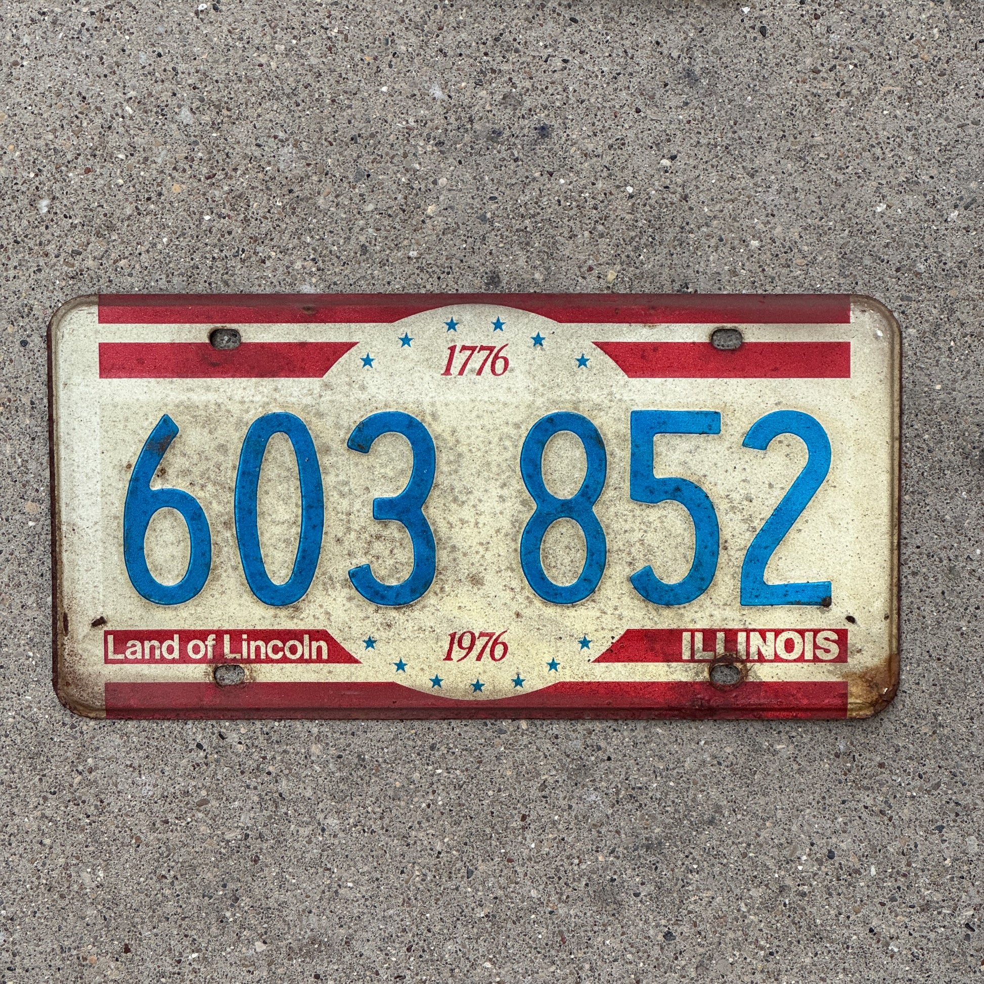 Photo of a 1976 Illinois License Plate Auto Tag Garage Decor Vintage Bicentennial 603 852 with original patina