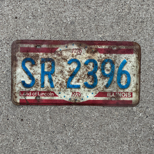 Photo of a 1976 Illinois License Plate Auto Tag Garage Decor Vintage Bicentennial SR 2396 with original patina