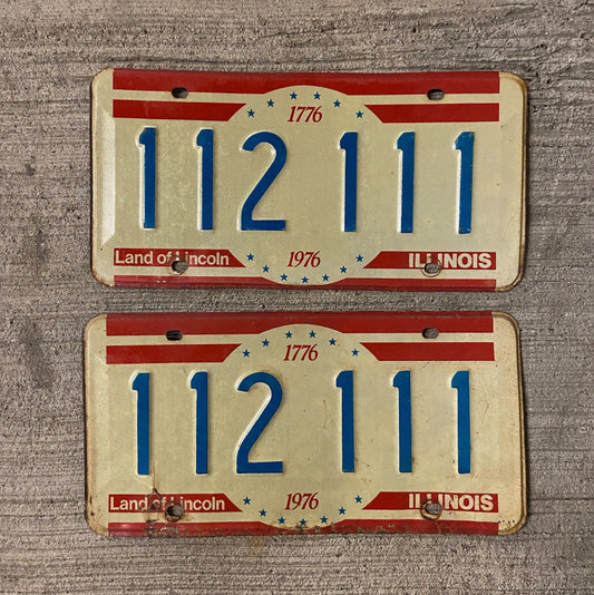Photo of a 1976 Illinois License Plate Pair Auto Tag Garage Decor Vintage 111 Repeat Repeating 112 111 with original patina