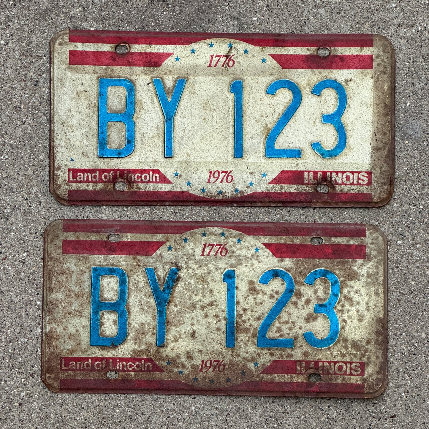 Photo of a 1976 Illinois License Plate Pair Auto Tag Garage Decor Vintage Bicentennial BY 123 with original patina