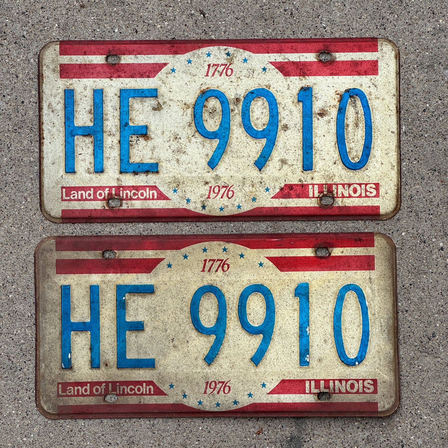Photo of a 1976 Illinois License Plate Pair Auto Tag Garage Decor Vintage Bicentennial HE 9910 with original patina