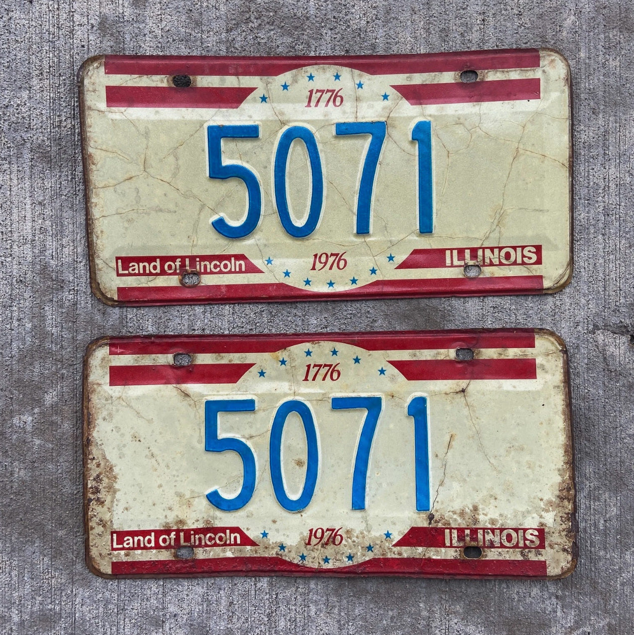 Photo of a 1976 Illinois License Plate Pair Auto Tag Garage Decor Vintage Low Number Four Digit 5071 with original patina