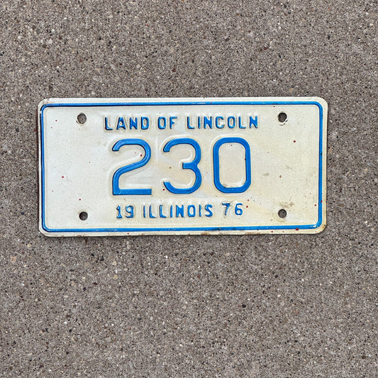 Photo of a 1976 Illinois Motorcycle License Plate Auto Tag Garage Decor Vintage Low Number Three Digit 230 with original patina