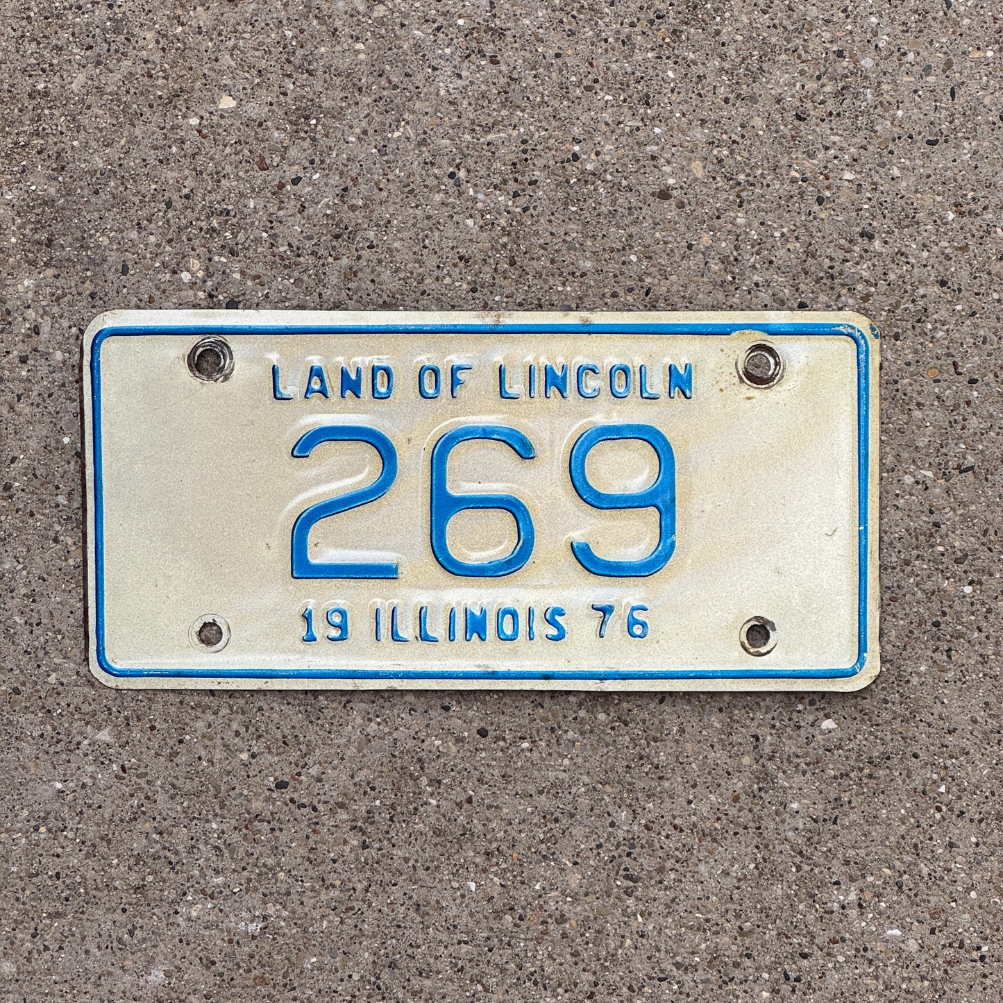 Photo of a 1976 Illinois Motorcycle License Plate Auto Tag Garage Decor Vintage Low Number Three Digit 269 with original patina