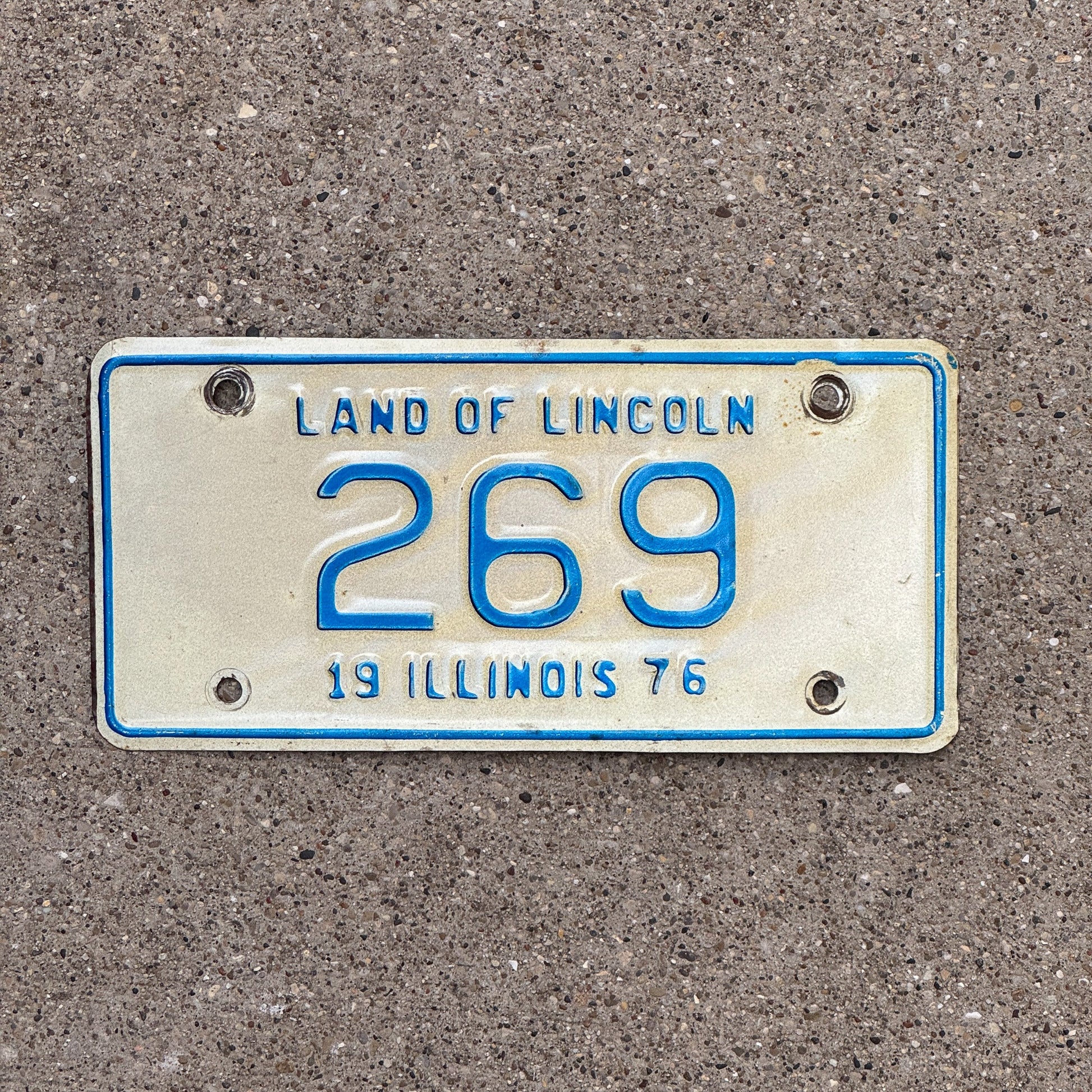 Photo of a 1976 Illinois Motorcycle License Plate Auto Tag Garage Decor Vintage Low Number Three Digit 269 with original patina