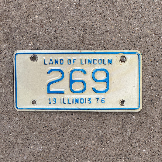 Photo of a 1976 Illinois Motorcycle License Plate Auto Tag Garage Decor Vintage Low Number Three Digit 269 with original patina