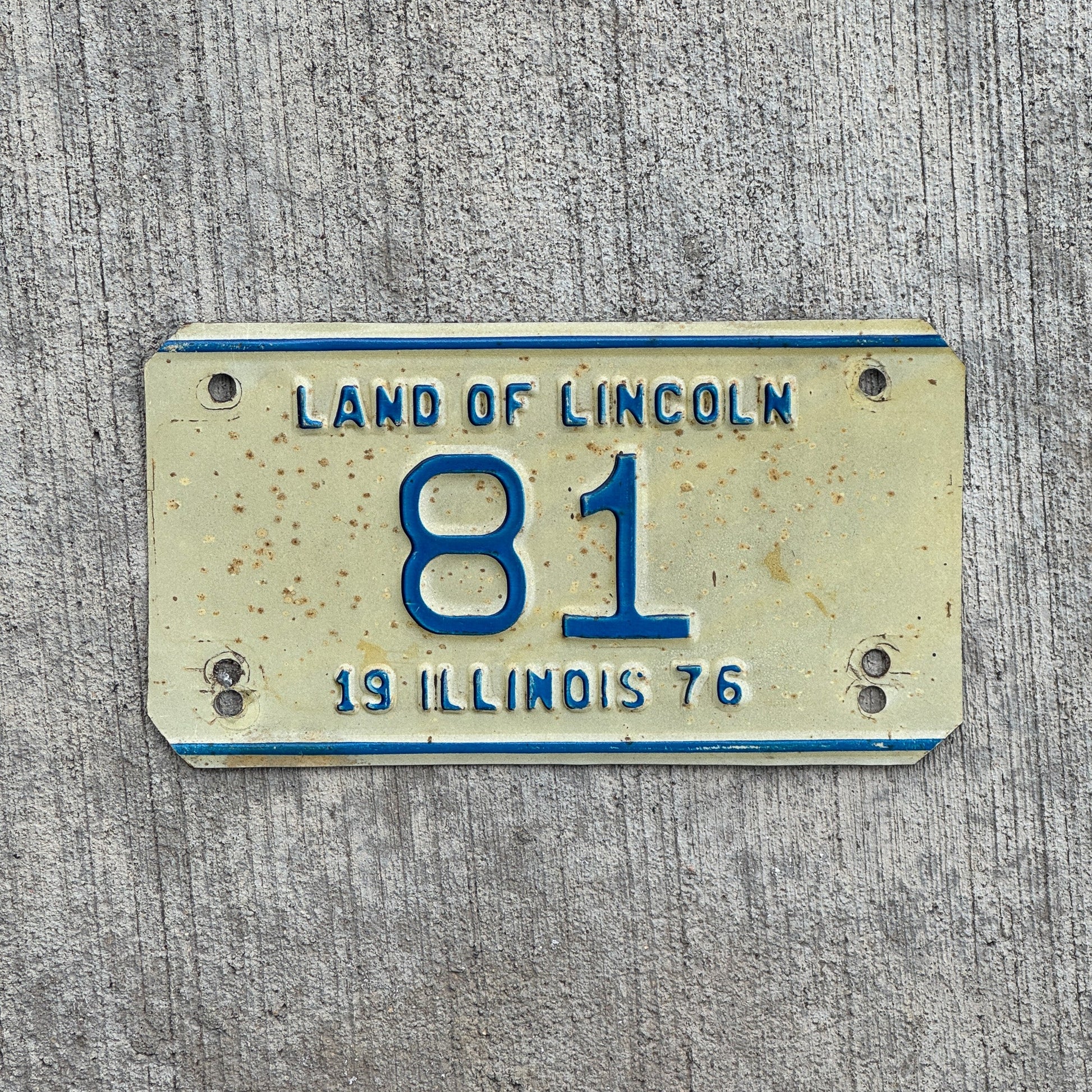 Photo of a 1976 Illinois Motorcycle License Plate Auto Tag Garage Decor Vintage Low Number Two Digit 81 with original patina