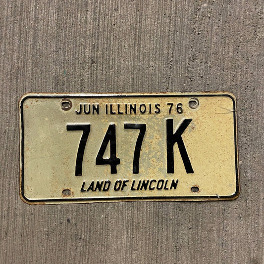 Photo of a 1976 Illinois Truck License Plate Auto Tag Garage Decor Vintage 747 K with original patina