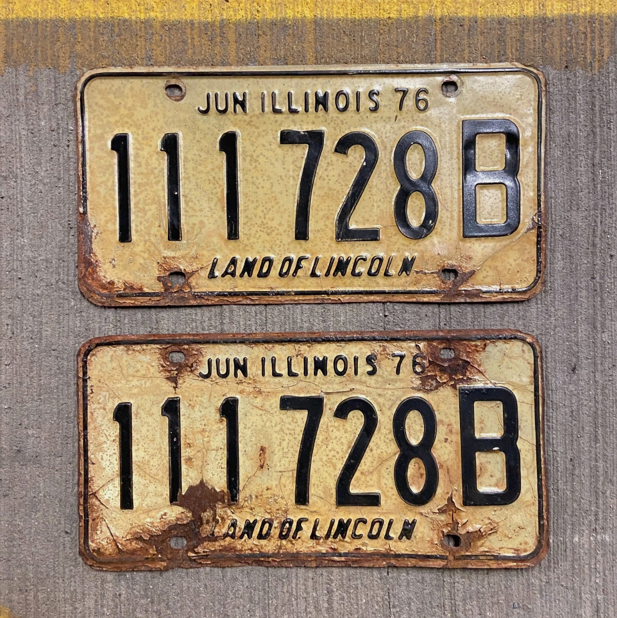 Photo of a 1976 Illinois Truck License Plate Pair Auto Tag Garage Decor Vintage Repeat Repeating 111 728 B with original patina