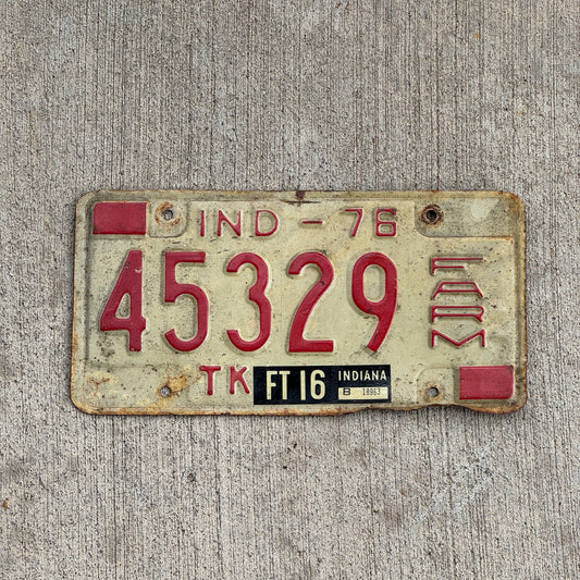 Photo of a 1976 Indiana Farm Truck License Plate Auto Tag Garage Decor Vintage 45329 with original patina