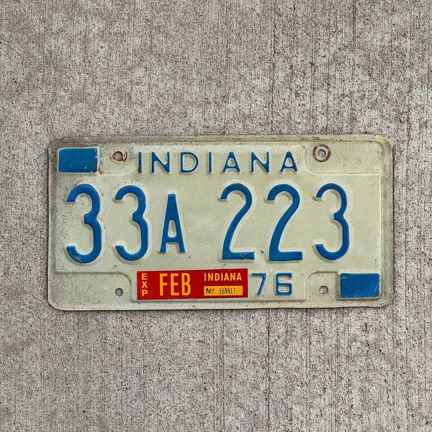 Photo of a 1976 Indiana License Plate Auto Tag Garage Decor Vintage Full House 33 A 223 with original patina