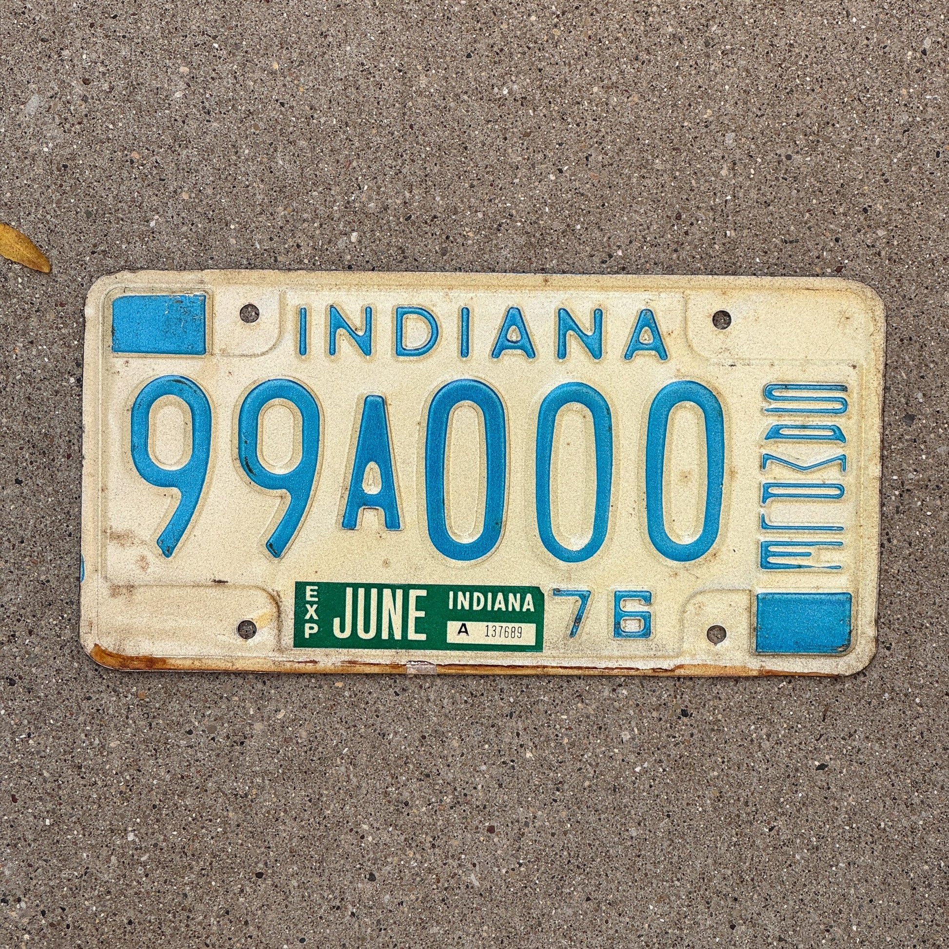 Photo of a 1976 Indiana Sample License Plate Auto Tag 1 Garage Decor 99A000 with original patina