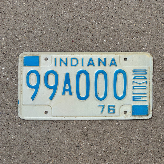 Photo of a 1976 Indiana Sample License Plate Auto Tag 3 Vintage 99A000 with original patina