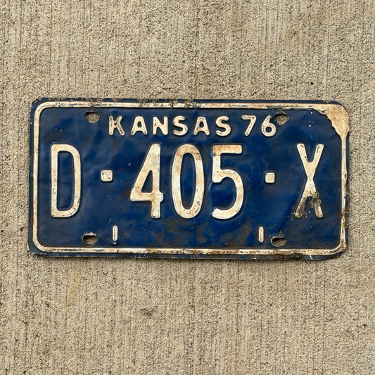 Photo of a 1976 Kansas Dealer License Plate Auto Tag Garage Decor Vintage D 405 X with original patina