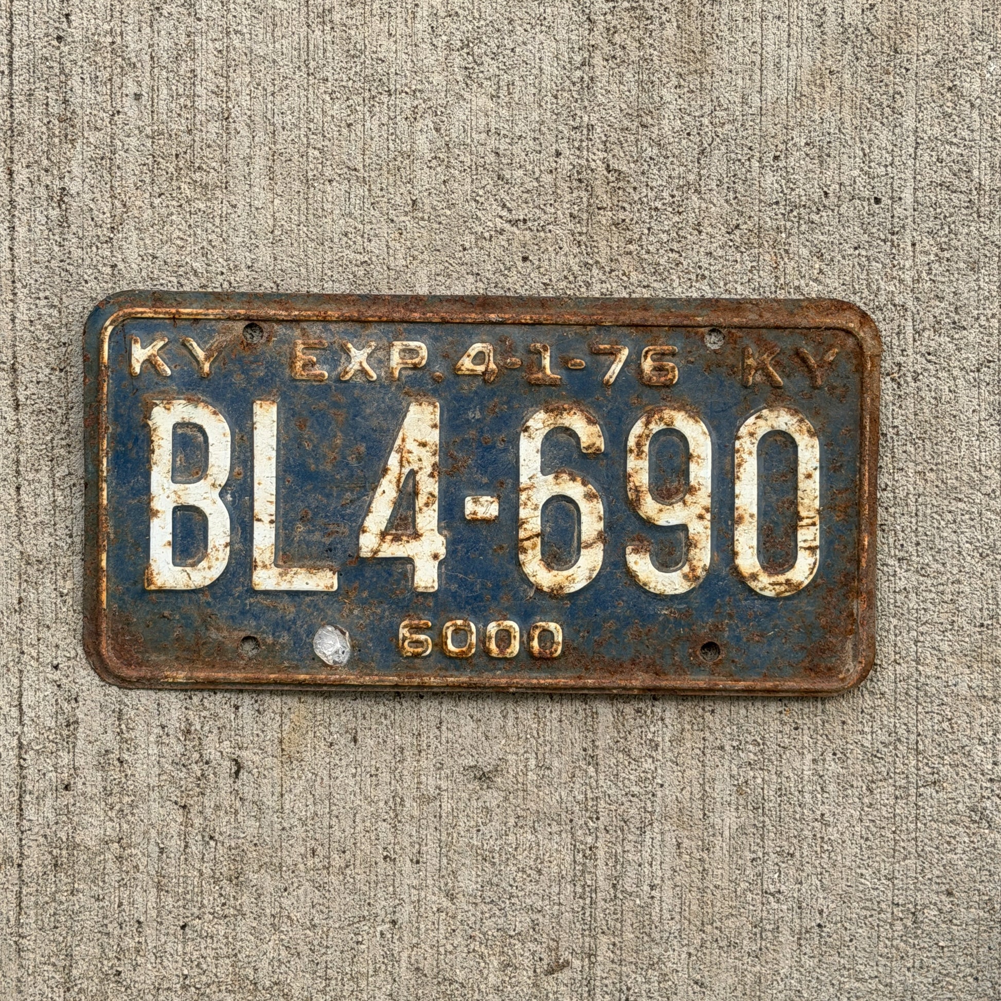 Photo of a 1976 Kentucky Truck License Plate Auto Tag Garage Decor Vintage BL 4 690 with original patina