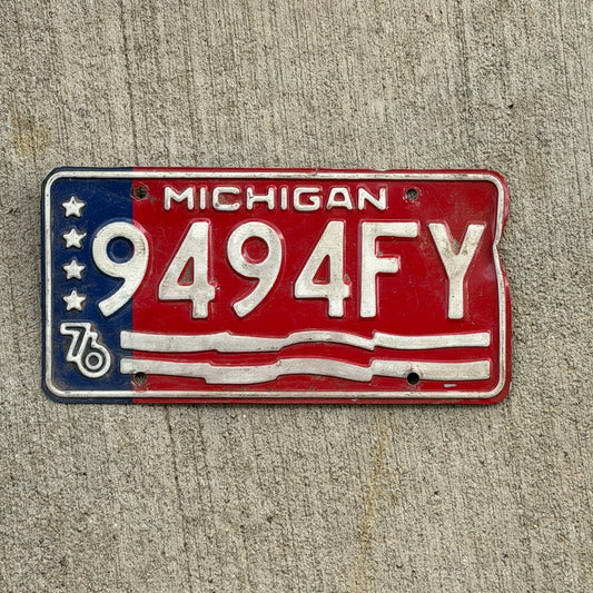 Photo of a 1976 Michigan Commercial License Plate Auto Tag Garage Decor Vintage Bicentennial 9494 FY with original patina