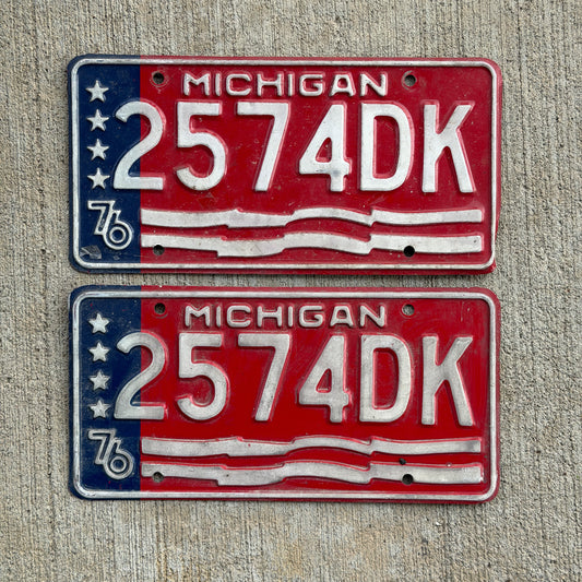 Photo of a 1976 Michigan Commercial License Plate Pair Auto Tag Garage Decor Vintage Bicentennial 2574 DK with original patina