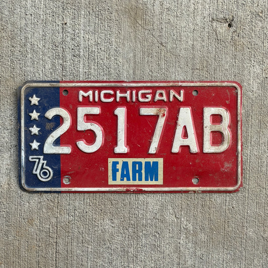 Photo of a 1976 Michigan Farm License Plate Auto Tag Garage Decor Vintage Bicentennial 2517 AB with original patina