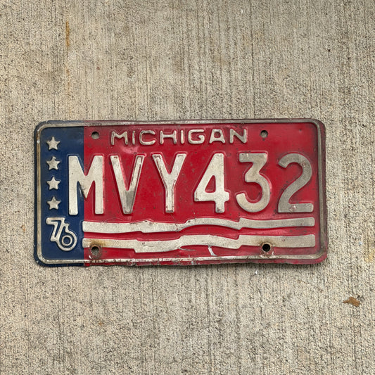 Photo of a 1976 Michigan License Plate Auto Tag Garage Decor Vintage Bicentennial MVY 432 with original patina