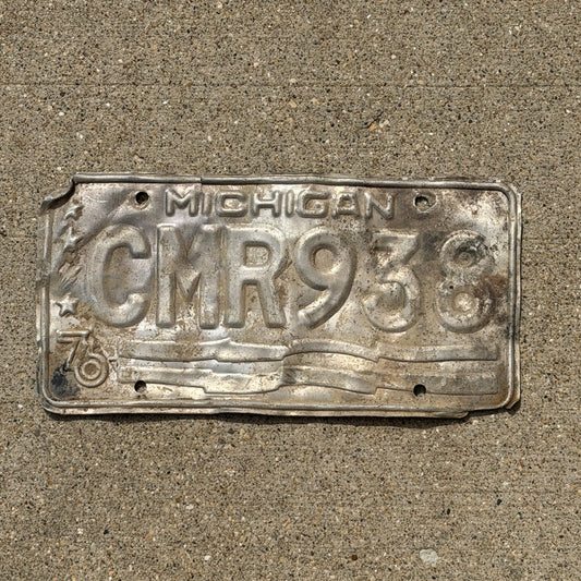 Photo of a 1976 Michigan License Plate Auto Tag Garage Decor Vintage CMR 938 with original patina