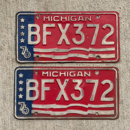 Photo of a 1976 Michigan License Plate Pair Auto Tag Garage Decor Vintage Bicentennial BFX 372 with original patina