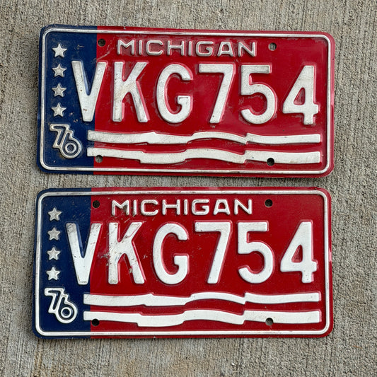 Photo of a 1976 Michigan License Plate Pair Auto Tag Garage Decor Vintage Bicentennial VKG 754 with original patina