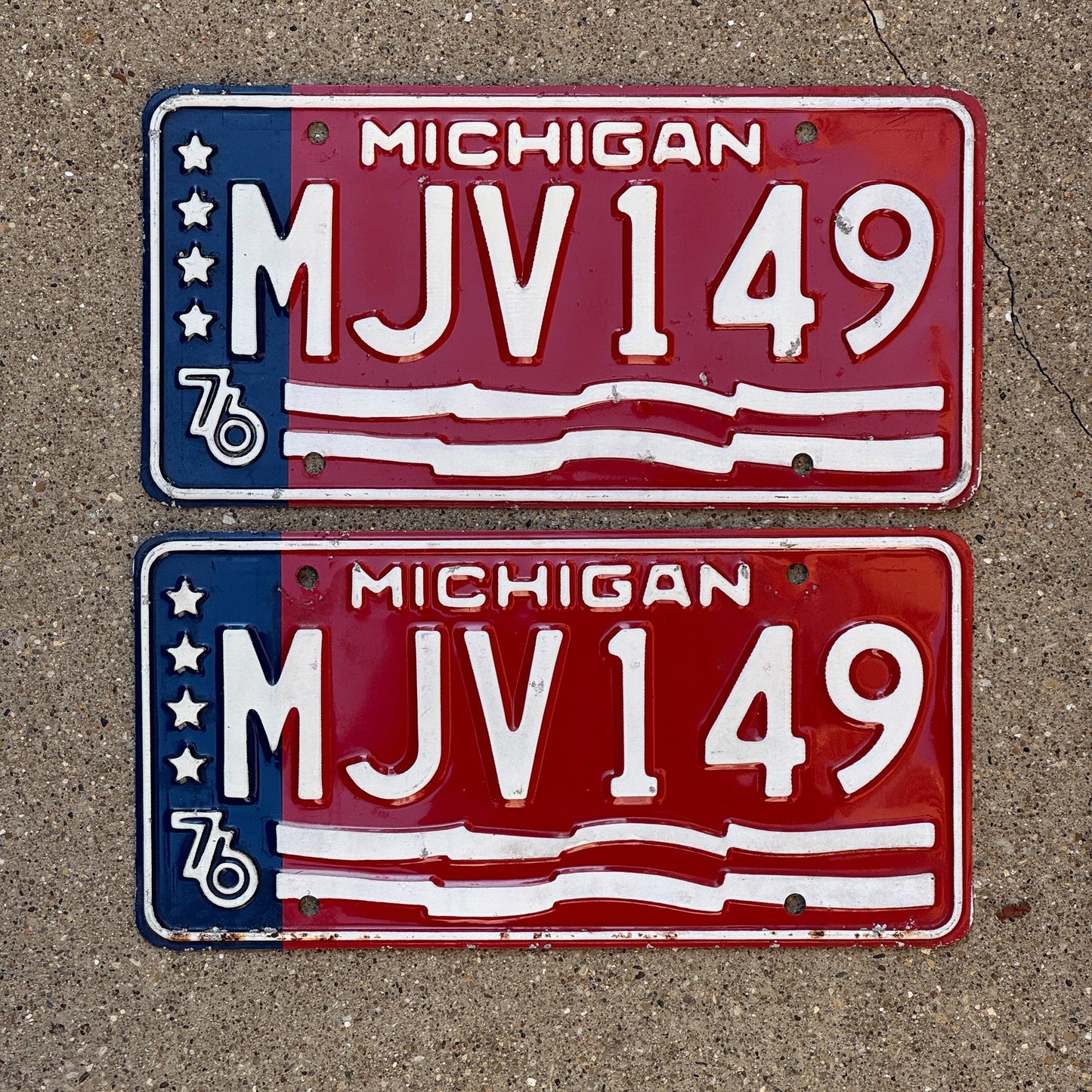 Photo of a 1976 Michigan License Plate Pair Auto Tag Garage Decor Vintage MJV 149