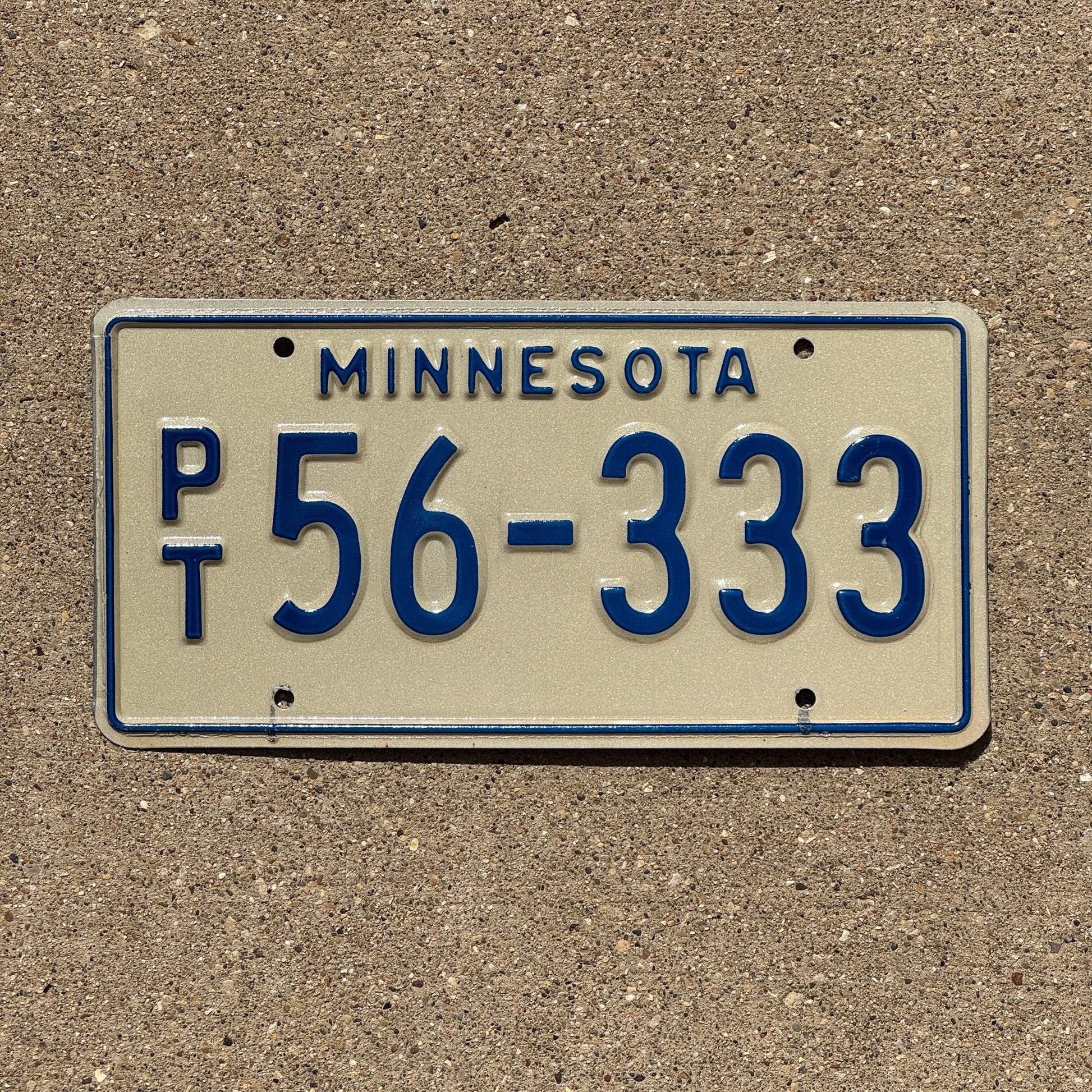 Photo of a 1976 Minnesota Prorate Trailer License Plate Auto Tag Garage Decor Vintage Repeat Repeating PT 56 333