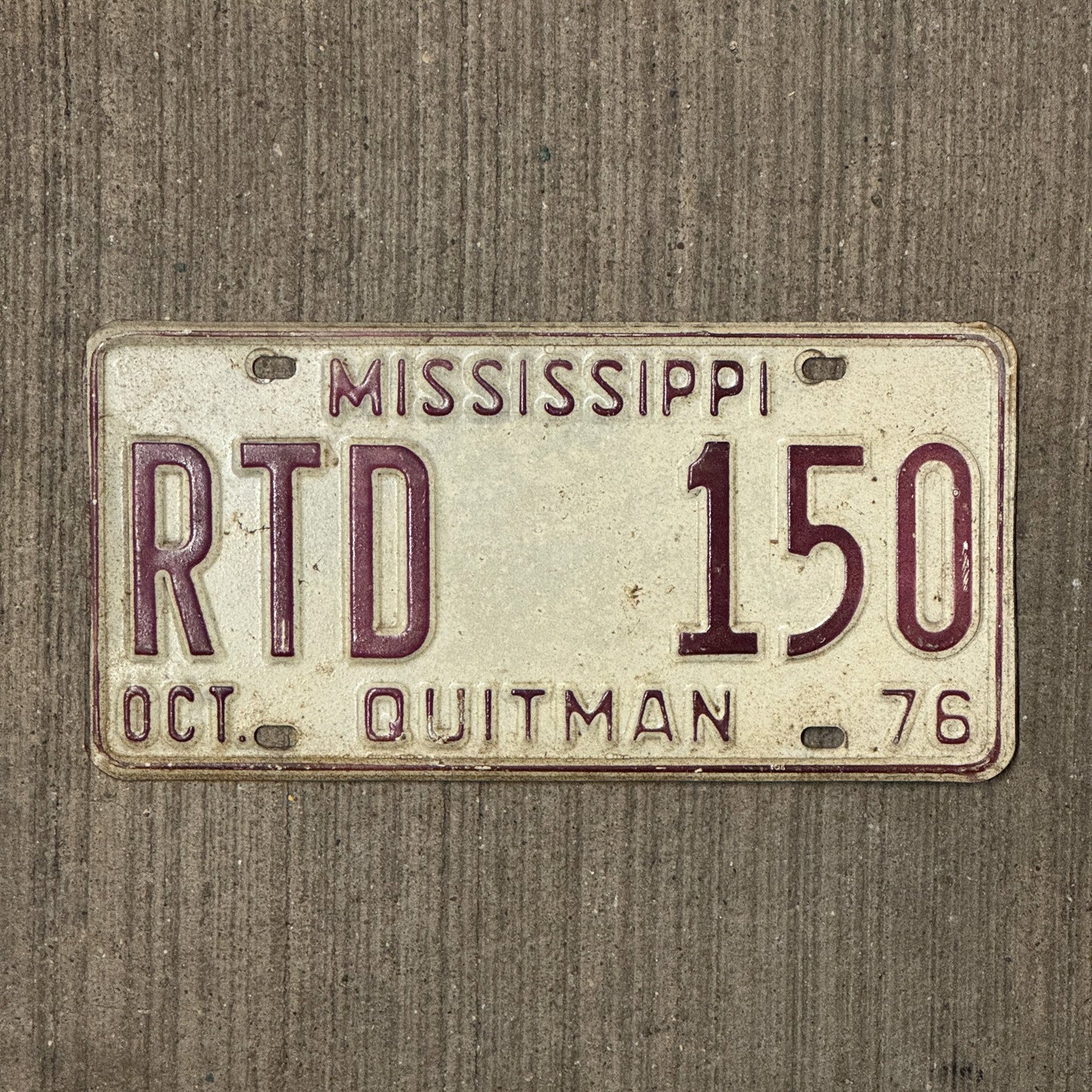 Photo of a 1976 Mississippi License Plate Auto Tag Garage Decor Vintage RTD 150 with original patina