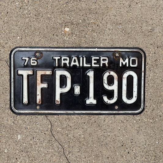 Photo of a 1976 Missouri Trailer License Plate Auto Tag Garage Decor Vintage TFP 190